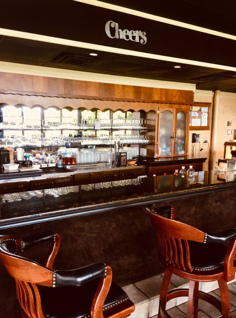 The dark-wood bar and lounge at McAlester Country Club
